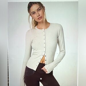 Vuori Women's Cream long sleeve pose twin cardigan